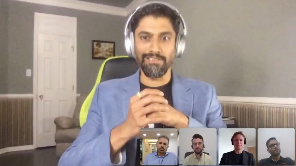 A screenshot of TINT's CEO, Sameer Kamat, speaking on Zoom with four other men, who appear on the bottom right-hand corner of the screenshot.