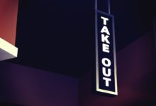 A sign that reads "take out"